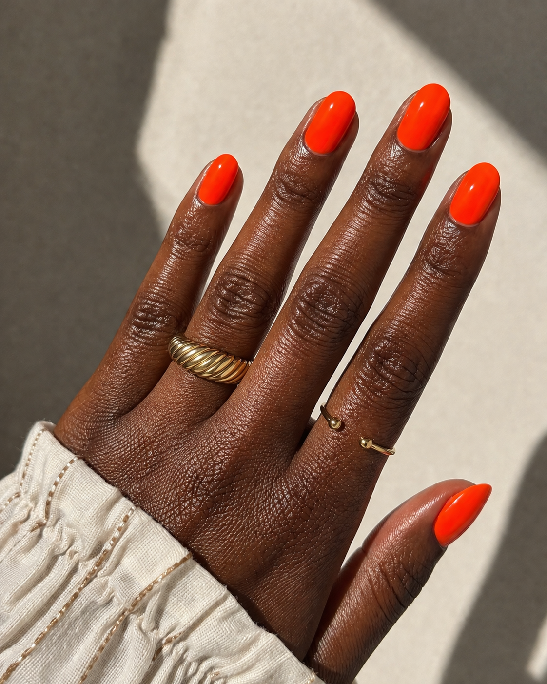 Neon nails on deep skin tones