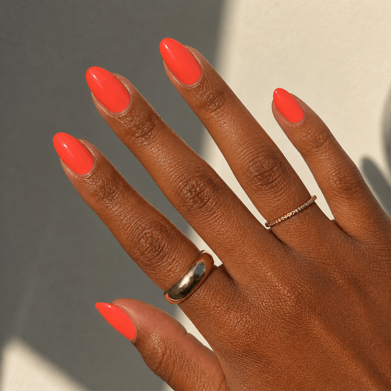Coral nails on medium and deeper skin tones